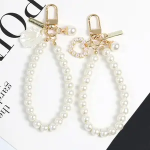 Pearls Beaded Alloy Keychains for Women New Minimalist Car Bag Bluetooth Headset Key Rings Pendant Jewelry Wholesale