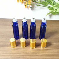 Vente en gros de flacons en verre ronds bleus vides de 10 ml pour huiles essentielles avec bille roulante en métal