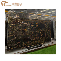 Portoro chinois marbre noir doré avec veines d'or intérieurs escaliers comptoirs de bande de roulement vanités de salle de bain dessus de table basse