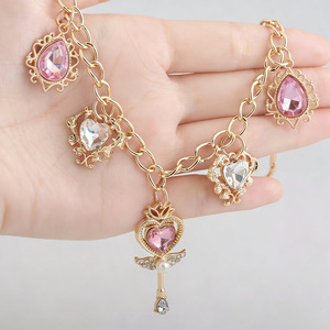 Nouvelle conception de chaîne de <span class=keywords><strong>sac</strong></span> <span class=keywords><strong>baguette</strong></span> magique vintage en or rose <span class=keywords><strong>avec</strong></span> breloque de décoration de <span class=keywords><strong>sac</strong></span> à main en cristal cœur rose pour femme - Product Image 3