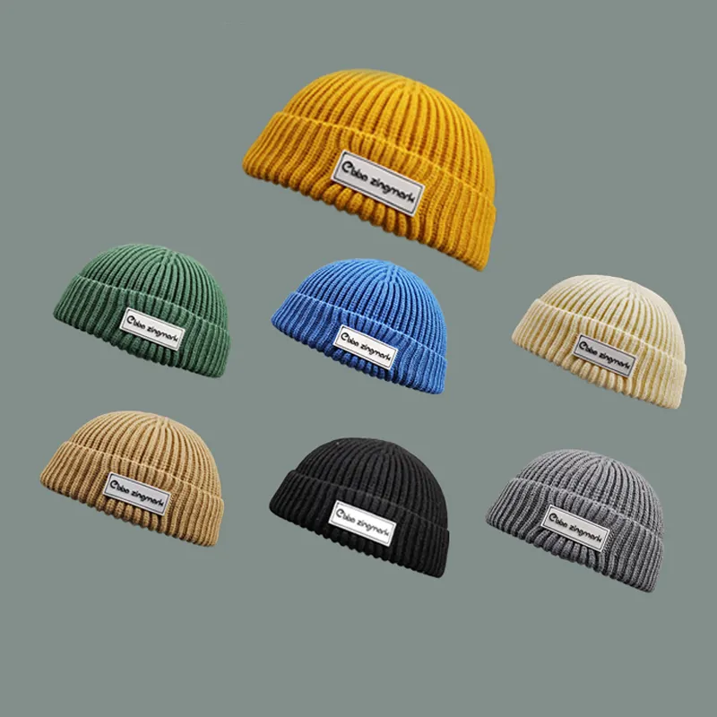 Wholesale unisex designer knit fisherman beanies cap knitted custom beanie winter hats with custom logo patch