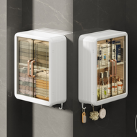 Boîte de rangement multifonctionnelle en plastique Support de rangement mural sans perforation Armoire de rangement de salle de bain avec 4 crochets pour serviettes
