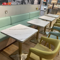 Table et chaises de cafétéria en surface solide, chaises et tables de cour de restauration