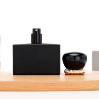 Flacon de parfum de luxe 50ml pour homme Flacon vaporisateur en verre rectangle noir avec bouchon de parfum de luxe