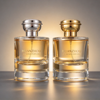 Bouteille de parfum en verre ronde large de 100 ml avec impression de logo doré personnalisée, vaporisateur à fine brume, bouchon de parfum noir mat
