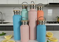 Bouteille isotherme en acier inoxydable à double paroi avec couvercle en bambou - Performance thermique de 12 à 24 heures - Sans BPA - Idéale pour les voyages