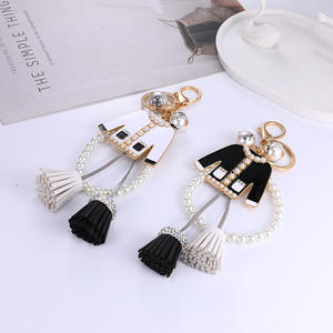 พวงกุญแจห้อยเสื้อผ้าทำจากโลหะผสมสังกะสีมีพู่รูปดอกคาเมลเลียเครื่องประดับมุกสไตล์เกาหลีของผู้หญิงที่งดงาม - Product Image 4