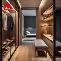 Armoire moderne Alland avec éclairage LED, style dalle en placage de noyer, en bois massif