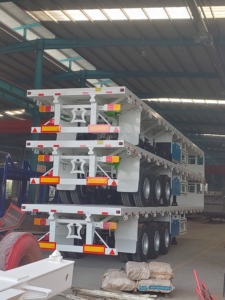 Semirremolque de Alta Calidad de 30-80 Toneladas, 2/3/4 Ejes, Plataforma Plana para Contenedores de 20, 40 y 45 Pies - Product Image 6