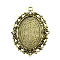 Pendentif ovale orné en filigrane ajouré, en alliage de zinc bronze antique, avec sertissage pour cabochon, pour bijoux camée victoriens