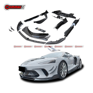 Kit de carrocería de fibra de carbono seca estilo Commas para Mclaren GT: Labio delantero, faldones laterales, ventilaciones de guardabarros, capó de motor y alerón trasero alto. - Product Image 1