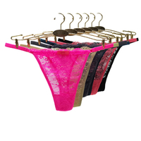 Tanga de encaje antibacteriano de talle bajo sin costuras para mujer con patrón floral bordado de nailon y elastano