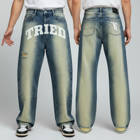Pantalon en jean décontracté coupe droite délavé style vintage avec sérigraphie personnalisée, effet usé et déchiré pour homme