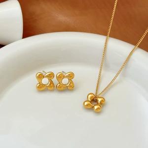 Parure de bijoux pour femme en acier titane électroplaqué, style punk, avec fleur rotative, luxe léger et exquis, couleur or - Product Image 2