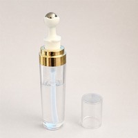 Flacon roll-on PETG 20 ml transparent pour sérum cosmétique avec col doré et tête de pression blanche