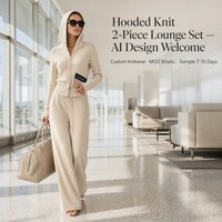 Ensembles tricotés deux pièces pour femmes, personnalisés OEM, couleur unie, hiver, veste à capuche zippée, pantalon évasé à jambes larges, vente en gros, faible MOQ