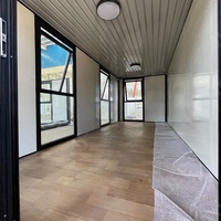 Maison conteneur préfabriquée de 20 pieds, portable et démontable, avec mur-rideau en verre, design moderne pour hôtel, appartement, villa, durée de vie de 15 ans