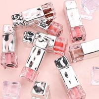 Rouge à lèvres liquide minéral végétalien OEM volumisant/laque à lèvres avec huile repulpante effet chaud