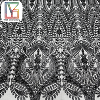 Tissu en dentelle de luxe noir avec pierres de cristal, tulle brodé, perles et paillettes pour robes de soirée élégantes pour femmes