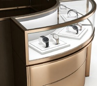 Vitrine de Luxe Courbe Dorée Rose pour Montres, Comptoir d'Îlot Haut de Gamme pour Bijoux avec Éclairage LED, Idéal pour Boutiques de Montres et Centres Commerciaux
