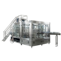 Machine de remplissage et d'embouteillage automatique de boissons gazeuses (CSD) en bouteilles de verre de 250 ml et 500 ml, capacité de 4000 à 20000 BPH, prix usine avec certification CE