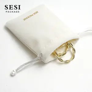 Logo personnalisé or estampage à chaud Beige daim velours bijoux cordon pochette sac pour montre Bracelet pochette cadeau