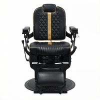 Fauteuil de Barbier Rétro Noir avec Finition Dorée, Hydraulique, Inclinable, en Cuir, Appuie-tête et Repose-pieds Ajustables, Vente en Gros pour Salons de Coiffure