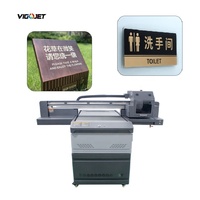I1600 6090 uv printer flatbed i3200 dengan roda kemeja datar tinta uv dapat mencetak semua bahan