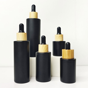 Wholesale 60ml Flat Shoulder <b>Essential</b> <b>Oil</b> Dropper Bottle Customizable Logo White Rubber Dropper Wood Grain Collar Glass Bottles - Product Image 4