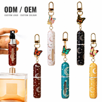 Atomiseur de parfum rechargeable avec breloque papillon, motif lune et étoile, flacon vaporisateur de voyage portable avec pendentif papillon