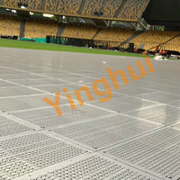 Revêtement de sol modulaire emboîtable robuste T-04 pour la protection des terrains de sport, idéal pour les concerts et événements