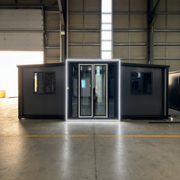 Villa modulaire préfabriquée avec entrée LED, studio moderne gris anthracite pour bureau à domicile dans la cour