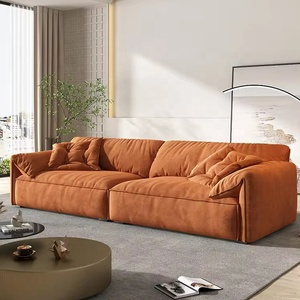 أريكة أذن الفيل من الجلد الصناعي الإيطالي والنسيج-مقطعية بكريم بسيط لغرفة المعيشة الفاخرة - Product Image 1