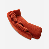 Ensemble de canapé sectionnel incurvé en tissu de chenille orange de luxe léger minimaliste haut de gamme personnalisable pour les hôtels Salons de beauté éponge