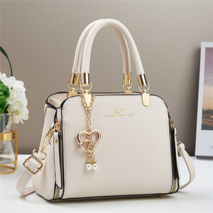 Hot-selling 2026 <strong>Pearl</strong> Solid Color Elegant Fashion Shoulder Crossbody Bags Luxury Women's <strong>Handbags</strong> - Product Image 1