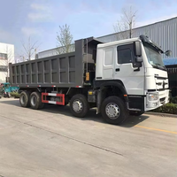 Б/у самосвал SINOTRUK HOWO 8x4, 371 л.с., 40 тонн, 12 колес, леворульный, для тяжелых условий эксплуатации, для горнодобывающей промышленности и строительства, 2020/2021 г.в.