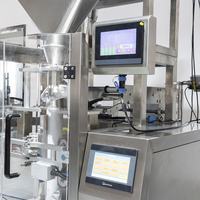 Machine d'emballage alimentaire verticale à pesage linéaire automatique à quatre voies, prix d'usine, pour le conditionnement de riz, de millet, de céréales, de sel, de sucre en sachets