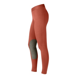 Pantalones de montar de cuero para mujer, de cintura media, sin costuras, con agarre completo en el asiento, bolsillos con cremallera, cierre de botón y parte inferior elástica en las piernas. - Product Image 2