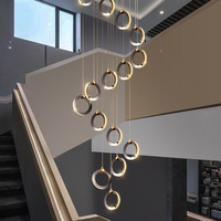 Lampe suspendue LED de luxe moderne noir perle avec hauteur réglable pour hôtels pour application de lustre d'escalier de hauts plafonds