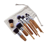 Kuas Makeup Bulu Sintetis Vegan Bambu Alami Berkualitas Tinggi 11pcs Set Kuas Makeup Smudge Gagang Bambu dengan Kantong Katun