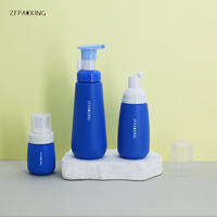 Petite bouteille en plastique à pompe moussante bleue mate personnalisée de 60 ml, savon liquide pour les mains, nettoyant facial, savon en mousse plastique