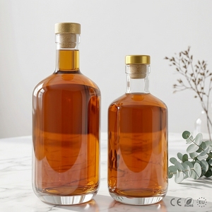 Bouteille en verre nordique élégante <span class=keywords><strong>de</strong></span> 750 ml, bouteille cylindrique pour spiritueux, <span class=keywords><strong>gin</strong></span>, vodka, whisky, avec bouchon en liège en forme <span class=keywords><strong>de</strong></span> T, vente en gros personnalisée - Product Image 1