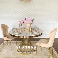 Table à manger moderne en acier inoxydable doré et marbre blanc 8 places ronde 8 pieds au design élégant pour hôtel ou salon