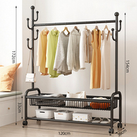 Porte-manteau mobile d'intérieur à deux niveaux pour le salon Porte-sac en métal pour le sol et le plafond pour les chambres à coucher