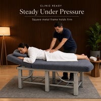 Table de massage à structure métallique durable avec appui-tête réglable et coussin matelassé profond pour spa, clinique et salle de traitement