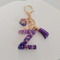 Portachiavi con Iniziale a Cuore in Glitter Viola - Portachiavi in Resina con 26 Lettere dell'Alfabeto, Ciondolo a Cuore e Nappa per Accessori Borsa Donna Ragazza