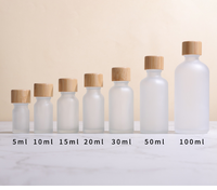 Vente flash Bouteilles en verre rondes 5ml 10ml 15ml 20ml 30ml 50ml 100ml Ambre Clair Huile essentielle Bouteille en verre Aromathérapie Teinture