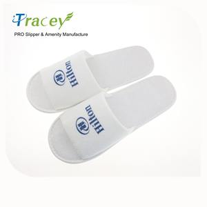 Chaussons jetables blancs de marque Tracey en gros, faible MOQ, stock bon marché, semelle antidérapante, options personnalisables pour les hôtels, utilisation en voyage - Product Image 5