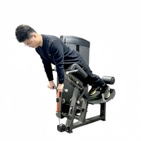 Appareil de musculation à charges guidées pour soulevé de hanche, soulevé de fessiers, et soulevé de fessiers couché sur le ventre