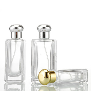 Wholesale square <b>glass</b> perfume <b>bottles</b> with rounded corners, <b>100ml</b>, with snap-on nozzles for spraying cosmetics. - Product Image 1